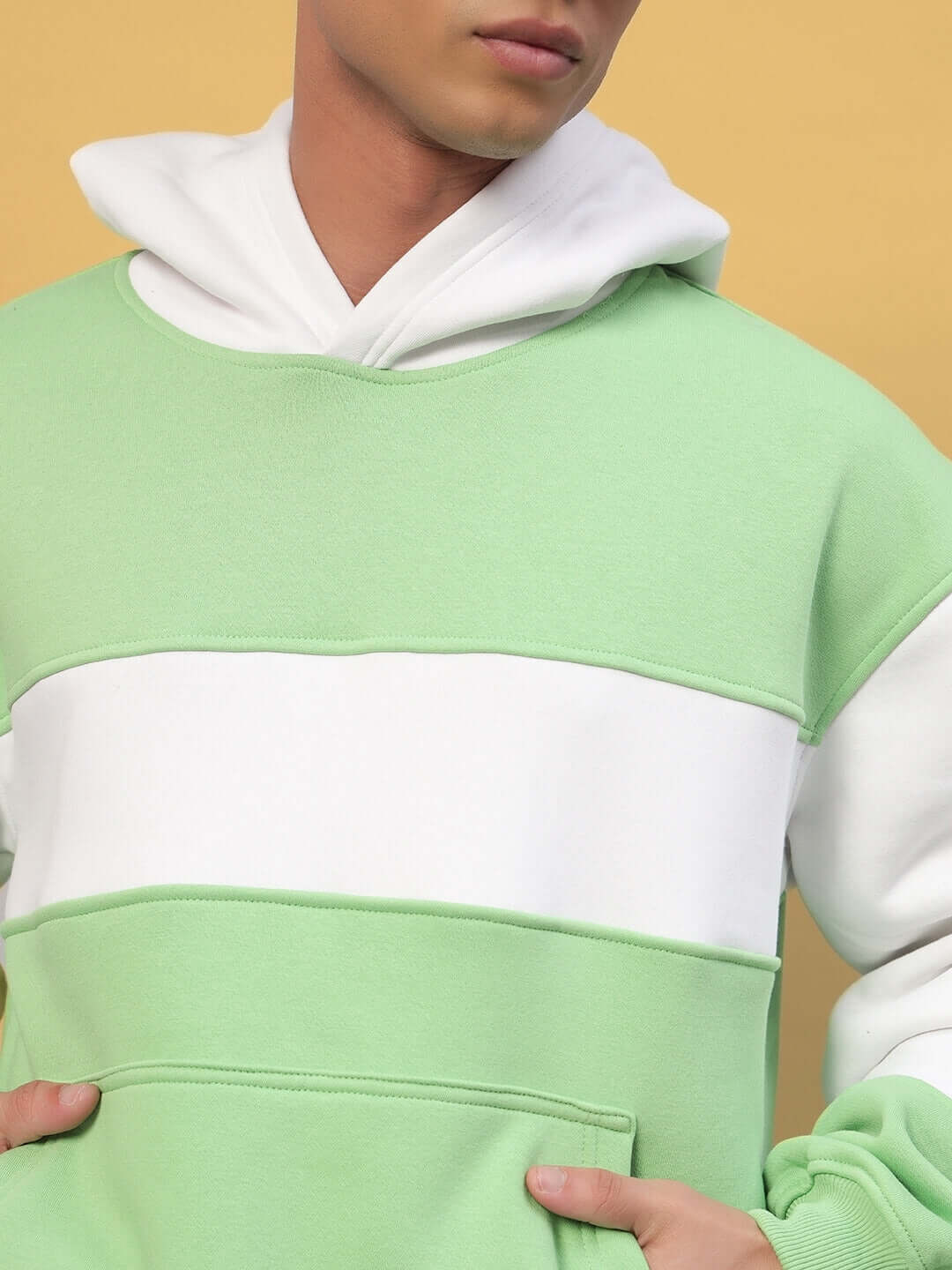 MINTED BLISS FLEECE COLORBLOCK CO-ORD GREEN WHITE hoodie showcasing trendy green and white colorblock design.