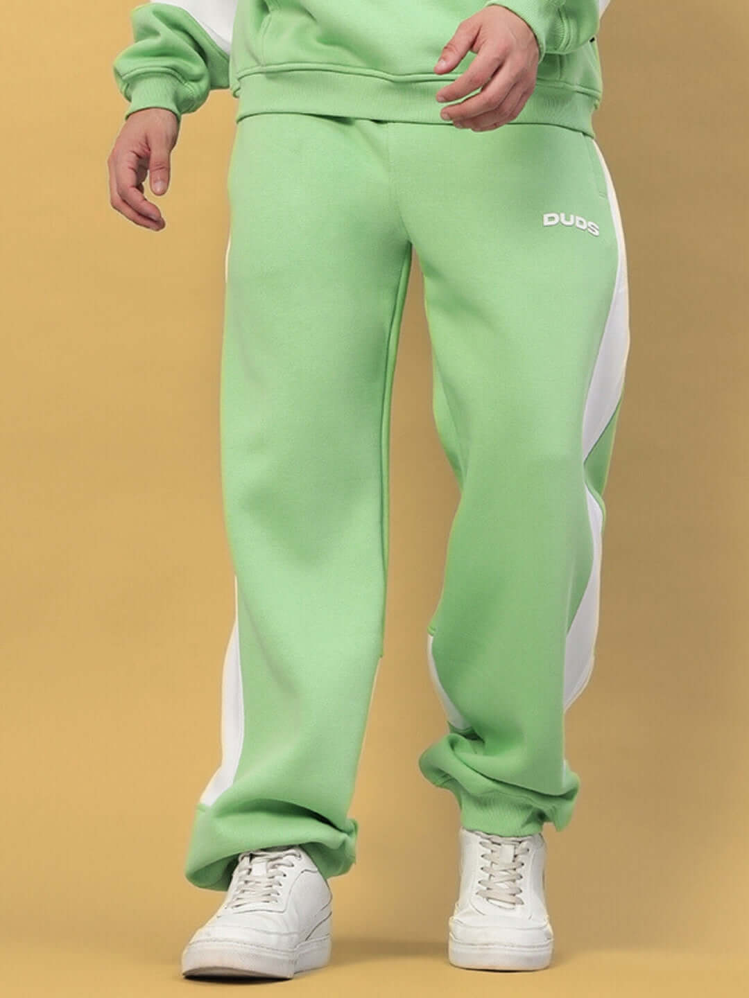 MINTED BLISS FLEECE COLORBLOCK CARGO PANT GREEN WHITE with bold design, shown on model, perfect for streetwear and casual style.