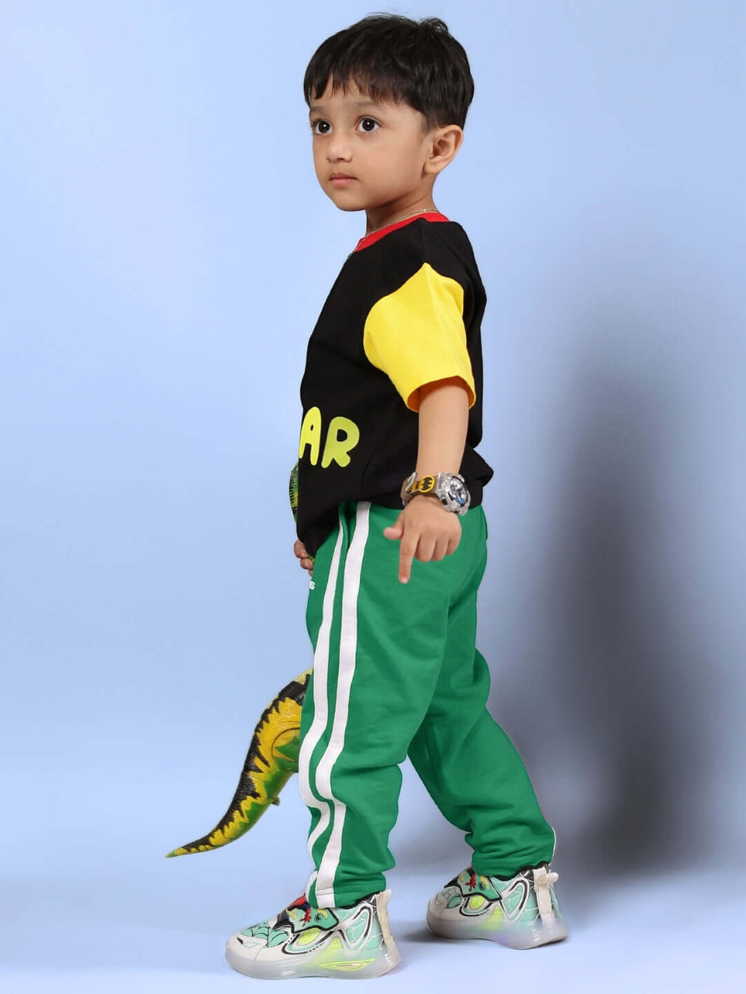Child wearing a MOCHA CO-ORD FOR BOYS & GIRLS BLACK GREEN featuring personalized design and vibrant colors.