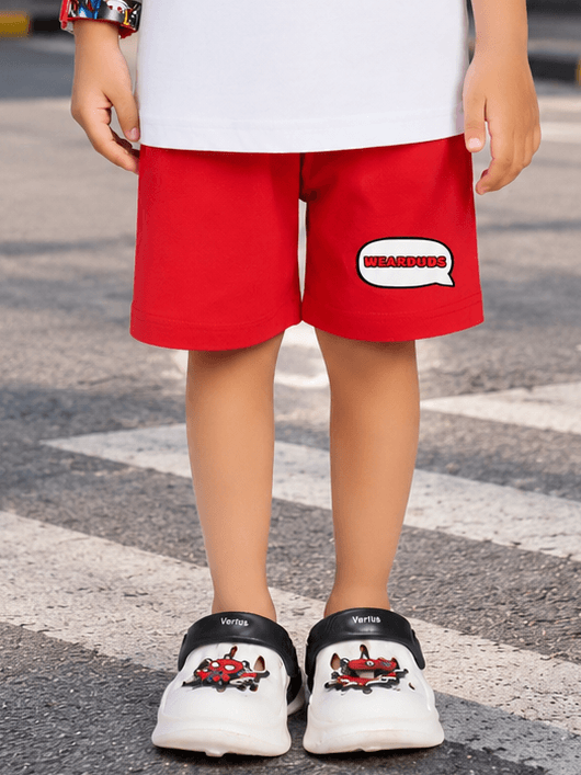 MONKEY BEATS COOL SHORTS FOR BOYS GIRLS RED worn by a child, showcasing playful design and vibrant color.