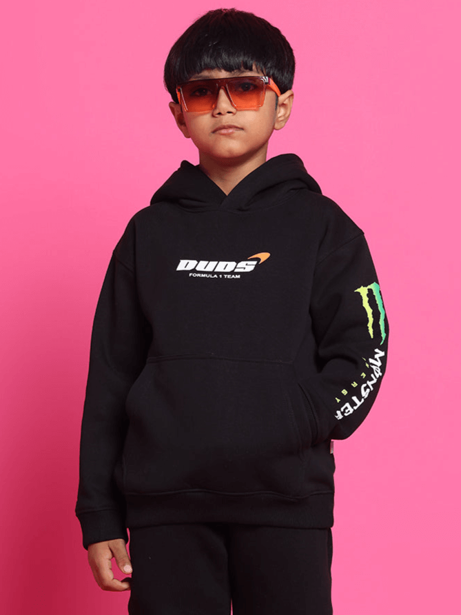 Child wearing MONSTER OVERSIZED HOODIE BOYS & GIRLS BLACK by WEAR DUDS, showcasing trendy oversized streetwear style.