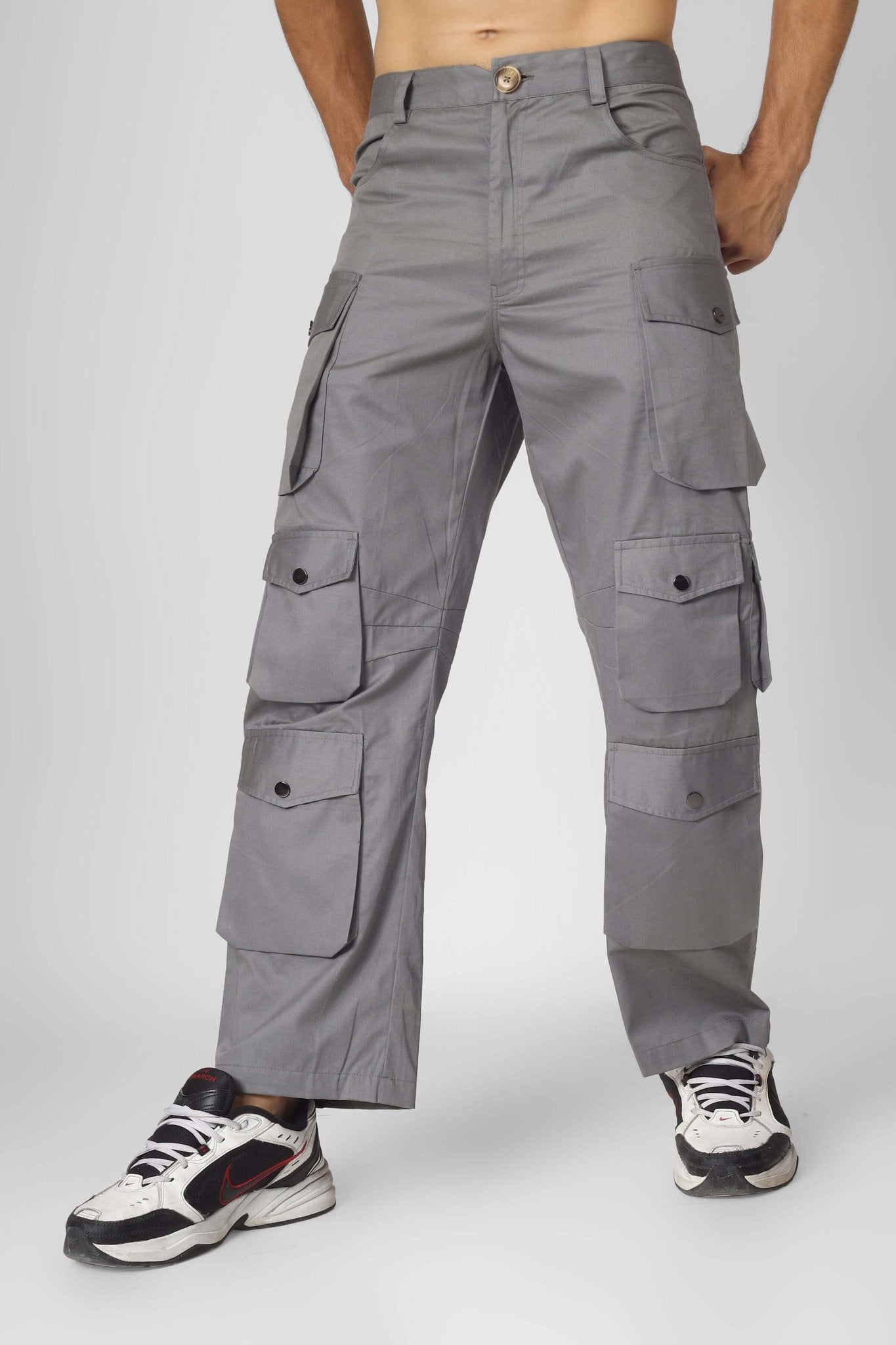 MOON STONE CARGO PANTS WITH 12 CARGO POCKET in moonstone grey, showcasing sleek design and functionality for streetwear enthusiasts.