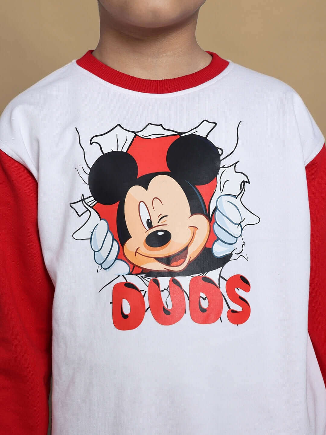 Child wearing Mortimer oversized co-ord set featuring cartoon design, white and red cotton fabric, from unisex kids clothing collection.