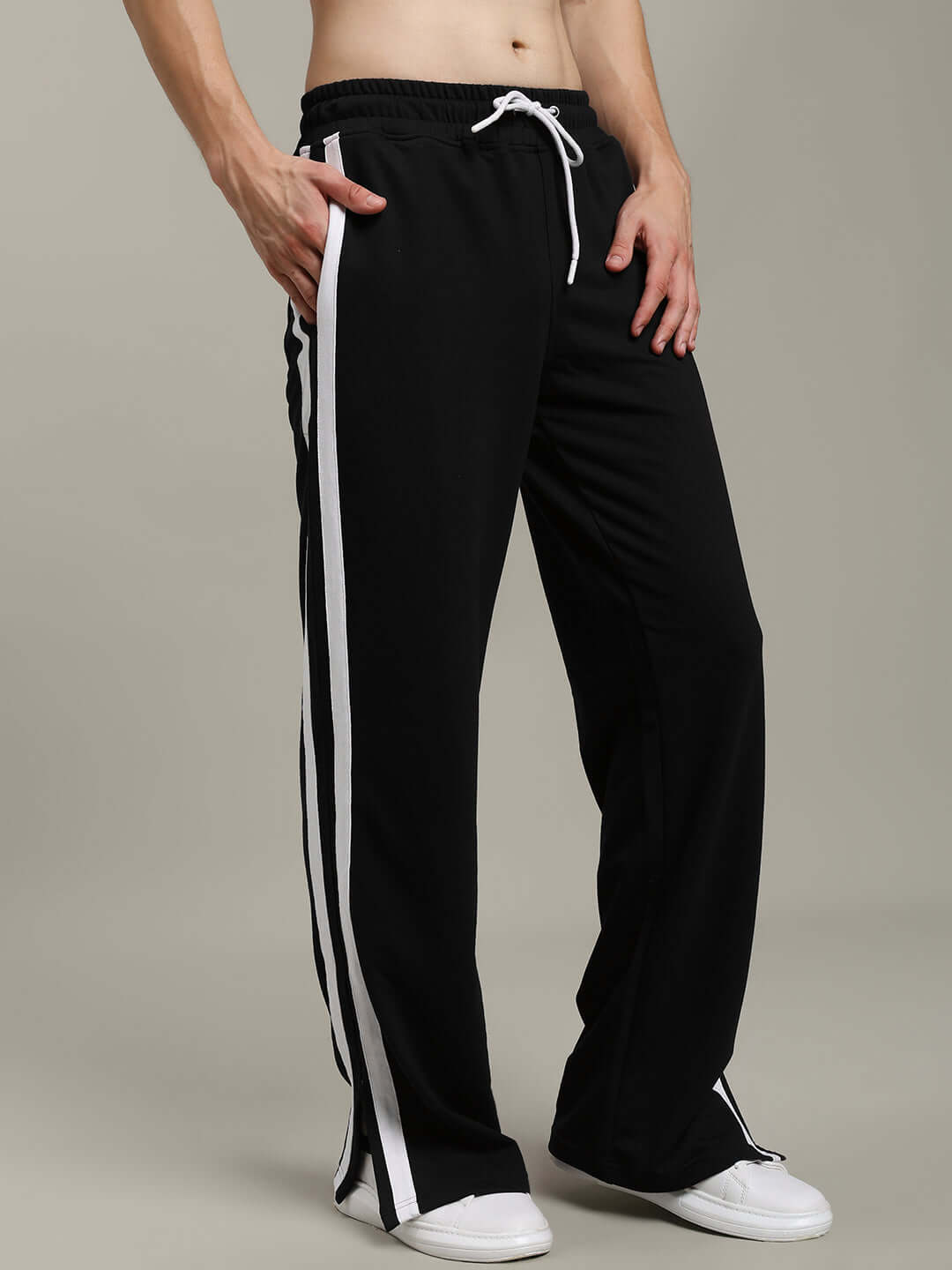 MOSCOW RELAXED FIT JOGGERS BLACK with comfortable waistband and side stripes, perfect for casual wear and lounging.