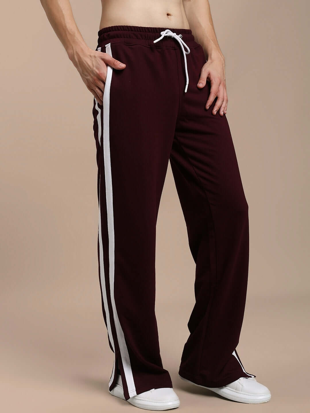Maroon relaxed fit joggers with white stripes, made to order by DUDS Tailors, offering a customizable fit for prepaid orders.