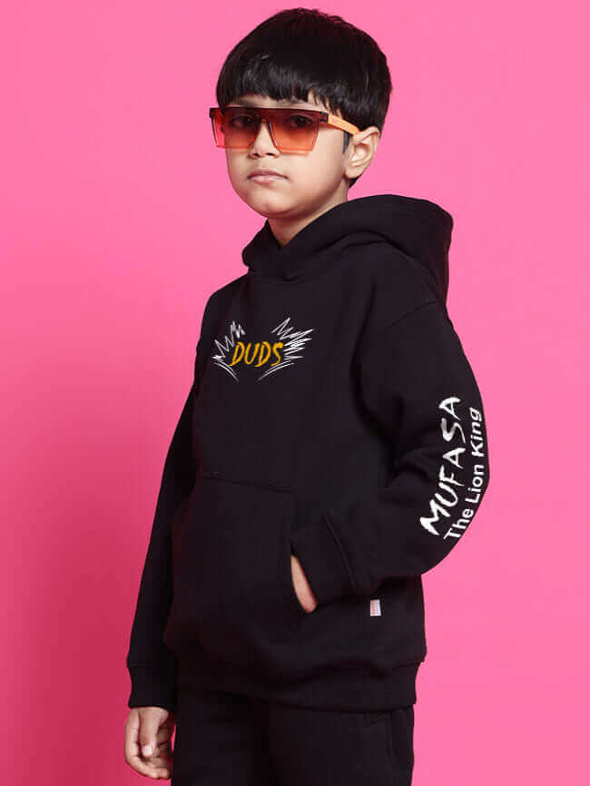 Child wearing Mufasa fleece co-ord for boys girls black, featuring Lion King design, perfect for cozy and stylish wear.