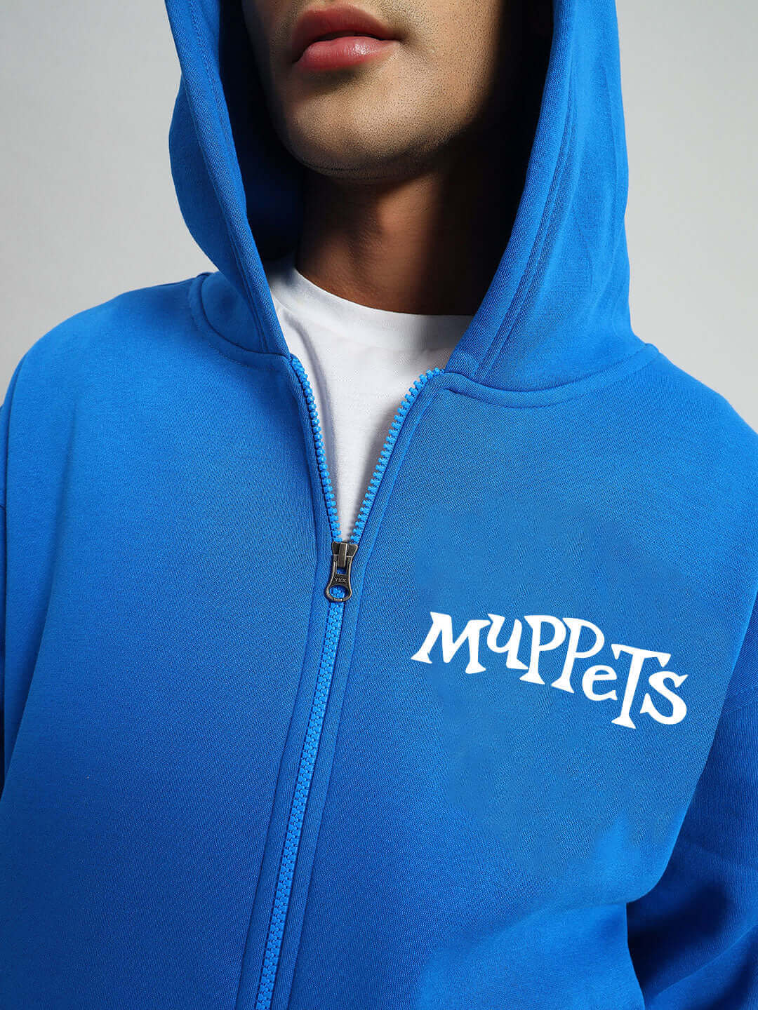 Blue Muppet fleece co-ord hoodie with a white logo, featuring a front zip and hood.