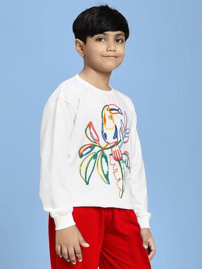NATURE VIBES BIRD PRINT SWEATSHIRT FOR BOYS AND GIRLS WHITE with colorful bird design worn by child in red pants