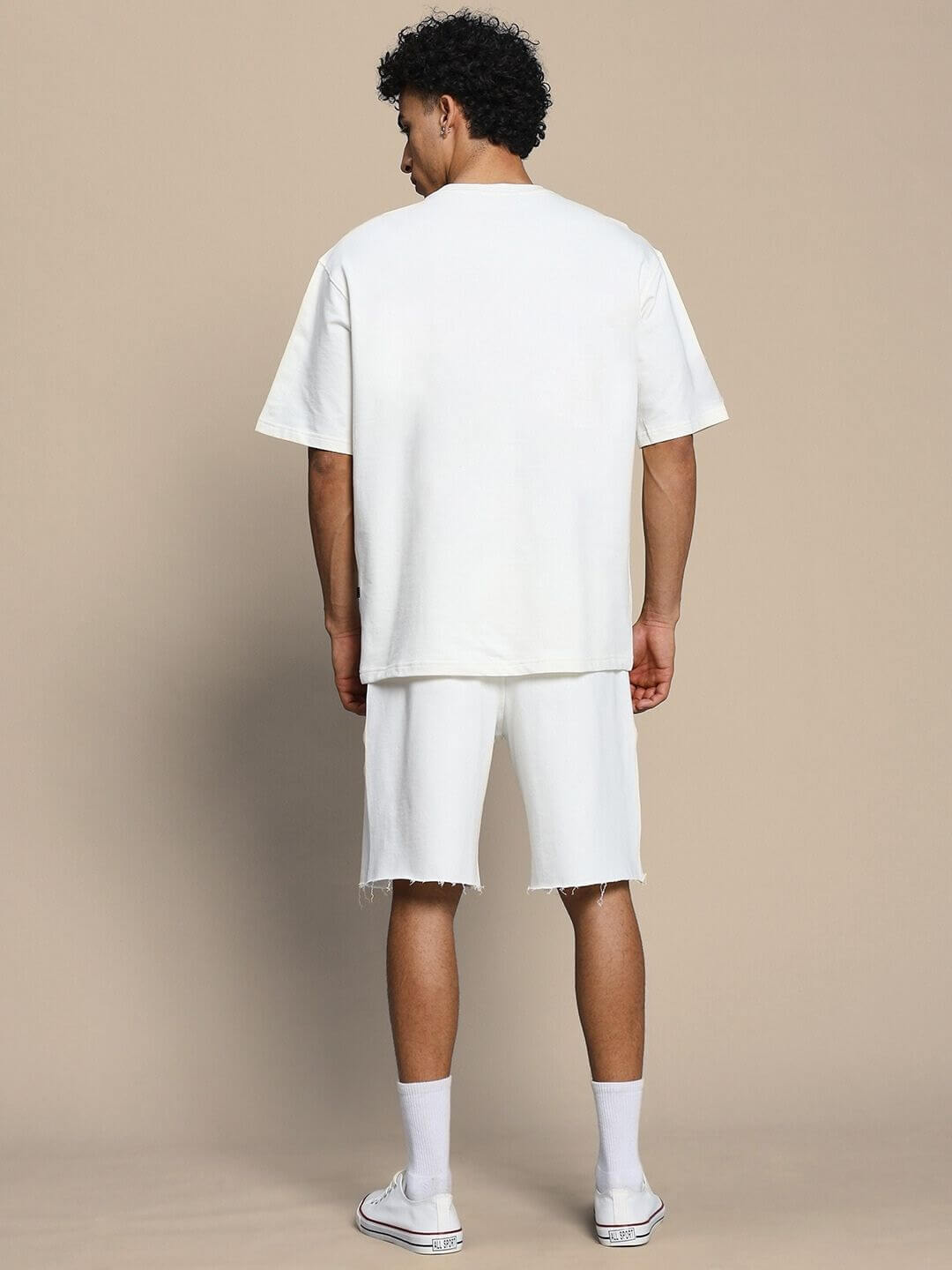 Back view of Neo Classic Skull Printed Co-ord Set in off white, featuring stylish t-shirt and shorts, perfect for fashionable wear.
