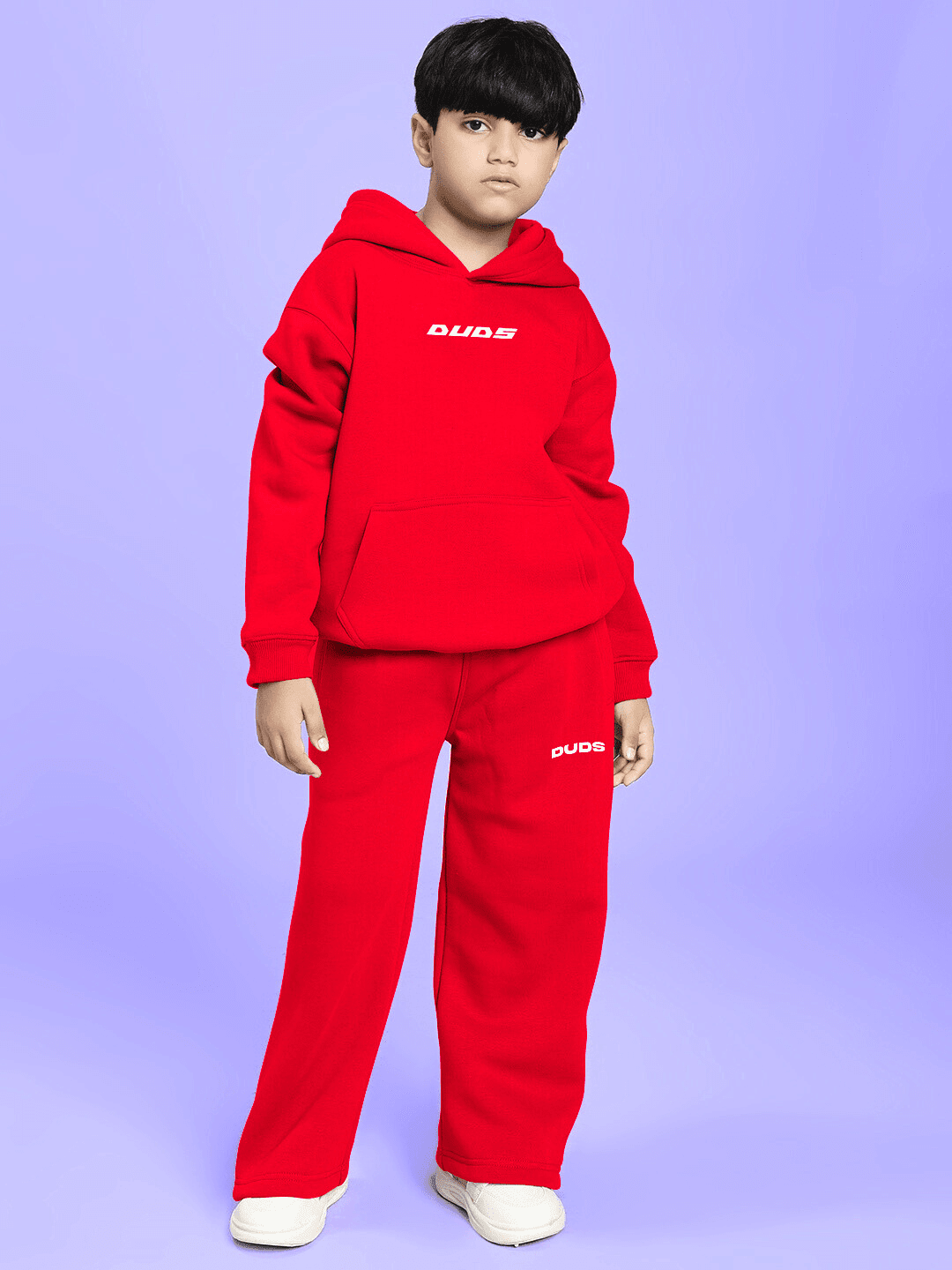 Child wearing NEVER BE MY RIVAL PRINT FLEECE CO-ORD FOR BOYS GIRLS RED, featuring a red hoodie and pants with playful graphic print.