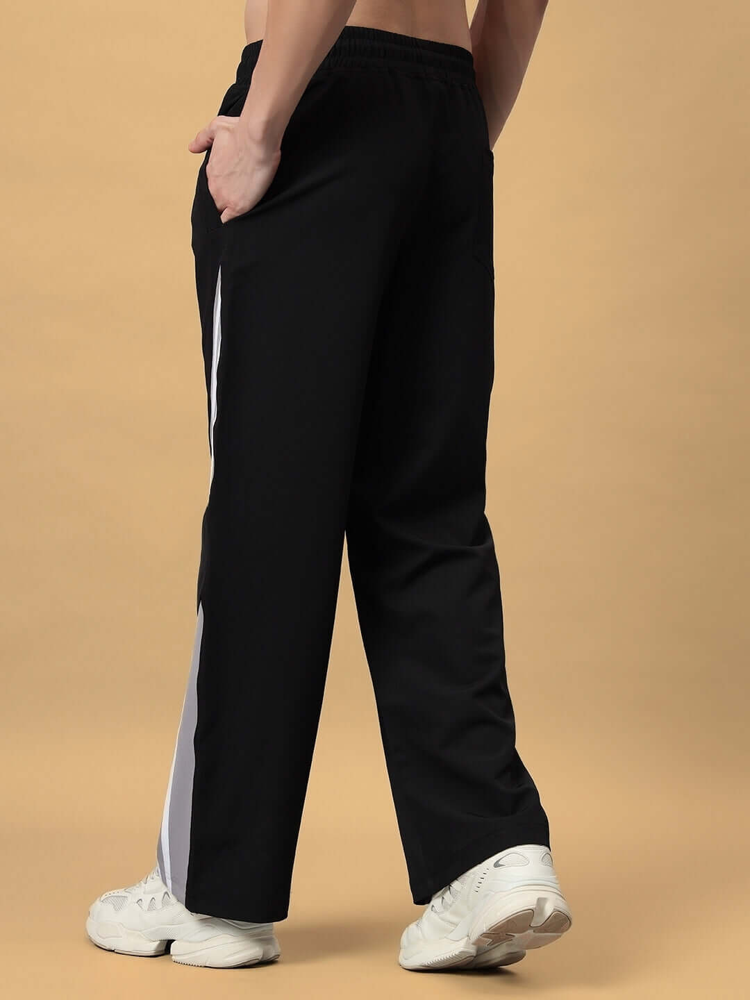 Back view of Nitro Relaxed Fit Cargo Pants in black, featuring a casual design and comfortable fit.