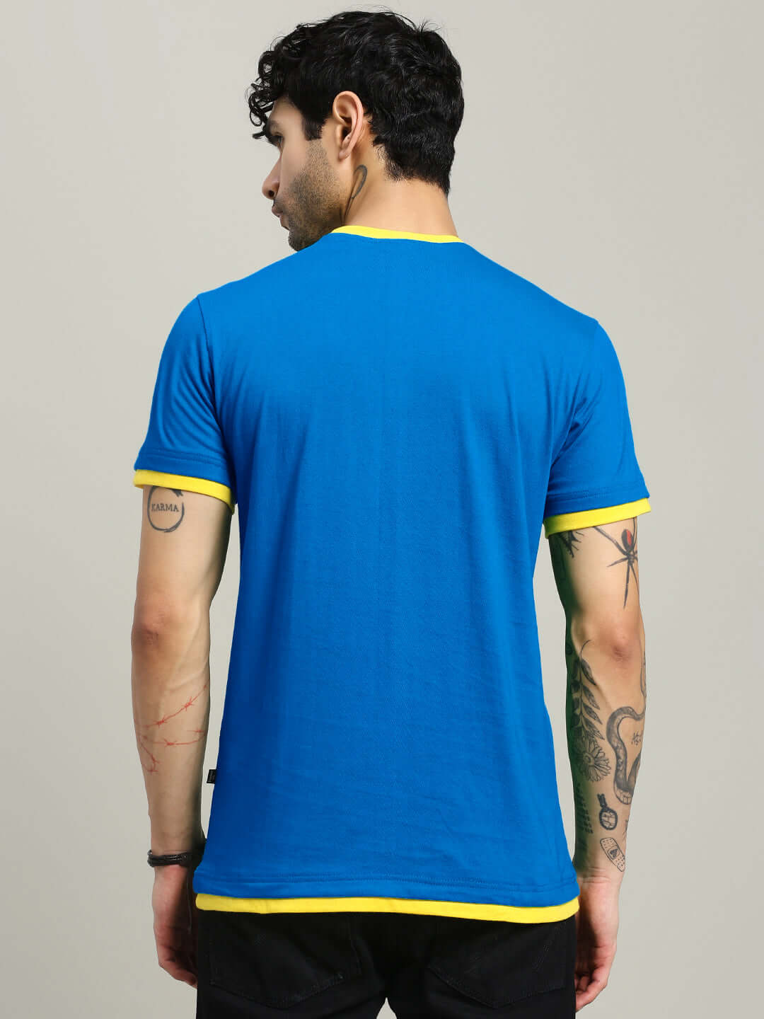 Back view of NO RISK PRINTED REGULAR FIT T-SHIRT ROYAL BLUE worn by male model.