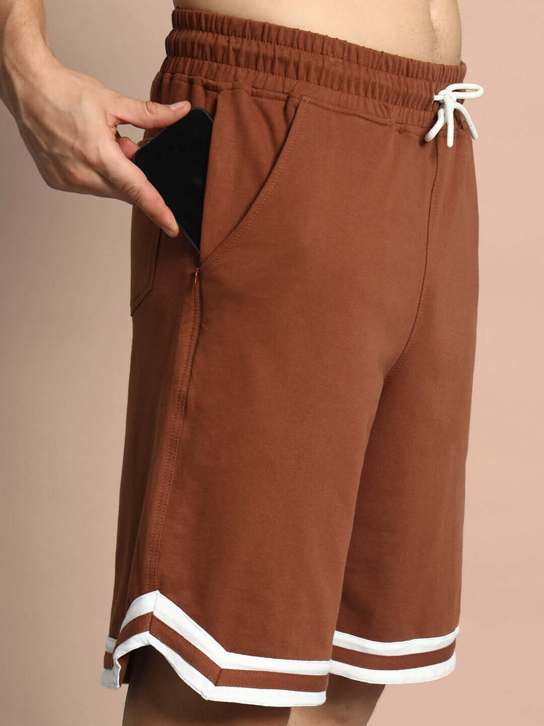 Brown Nordic co-ord shorts made of premium cotton French Terry Lycra with white trim, featuring an elastic waistband and drawstring.