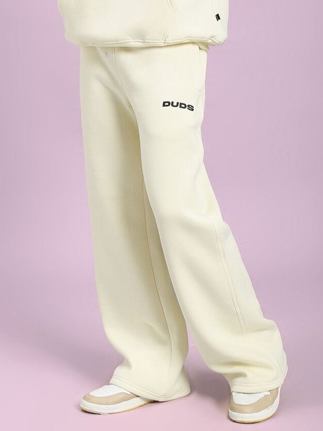 OCEAN BUDDIES JOGGER OFF-WHITE showcasing relaxed fit, playful style, crafted for comfort with unique sea life graphic.