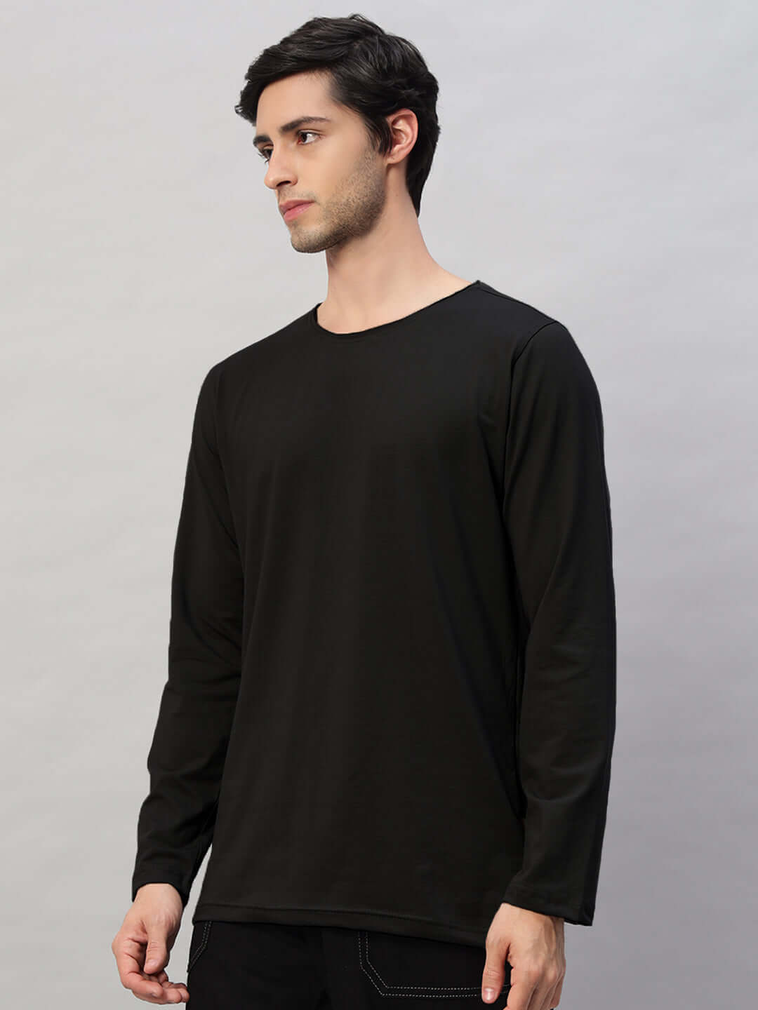 OMNI Slim Fit Sweatshirt in black, made from 100% cotton, shown on a model. Premium heavy gauge fabric, bio-washed for comfort. 190 GSM.