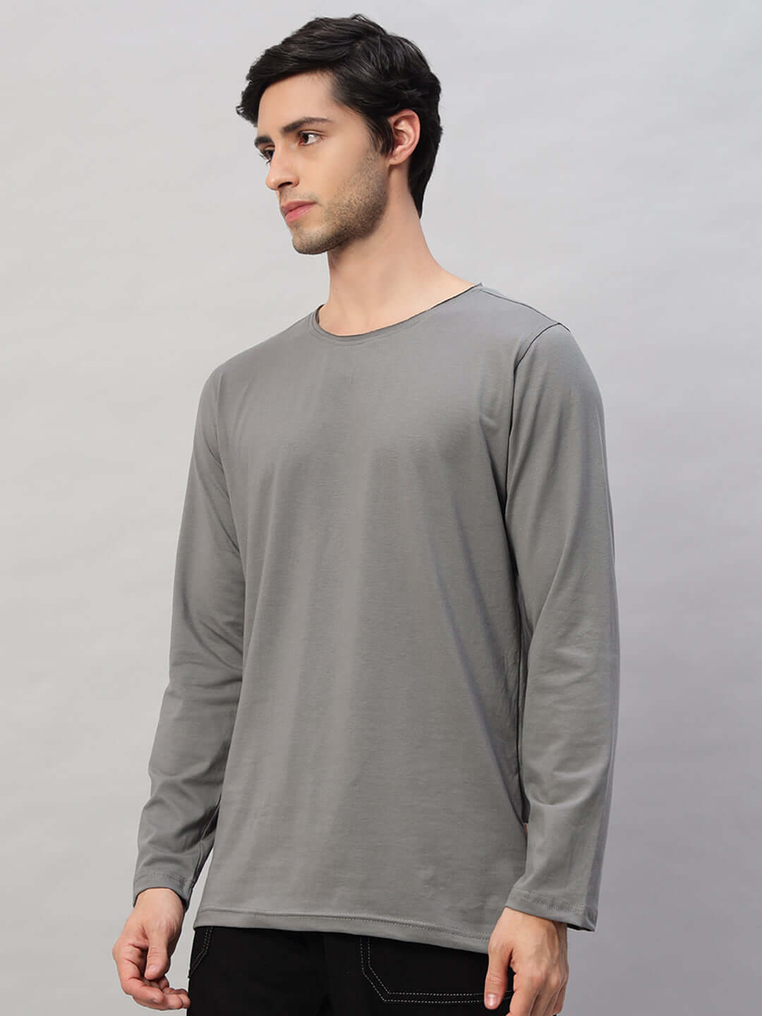 Model wearing OMNI Slim Fit Sweatshirt in grey, 100% cotton, 190 GSM bio-washed fabric. Premium design perfect for casual wear.