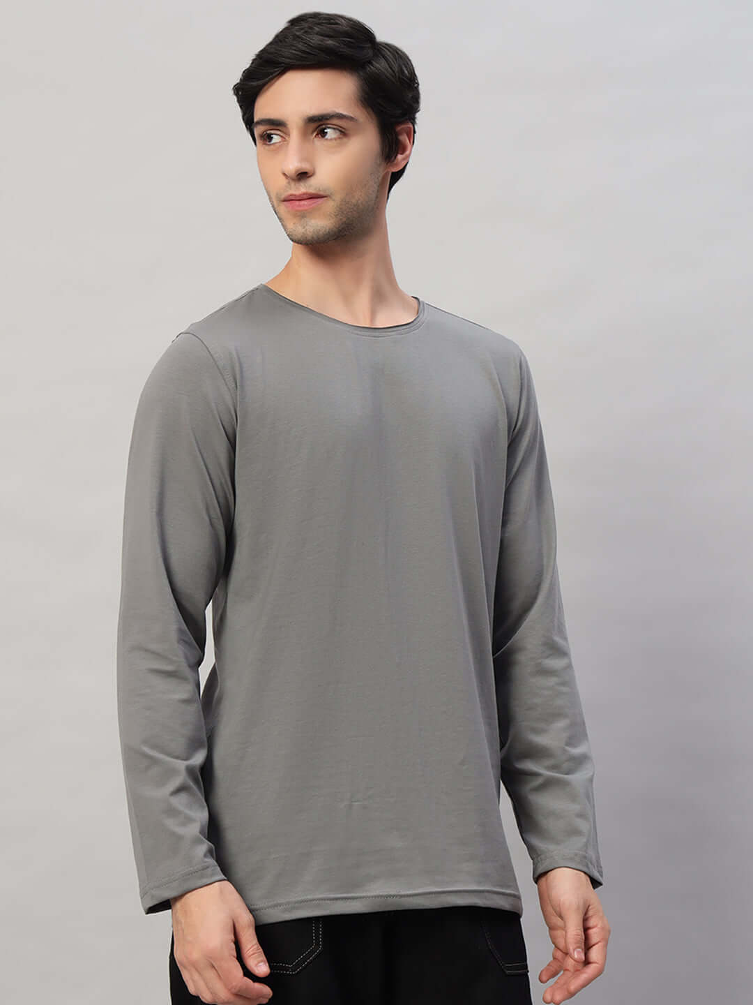 Model wearing grey OMNI Slim Fit Sweatshirt made of 100% cotton, premium heavy gauge fabric. Bio-washed for softness. Made in India.