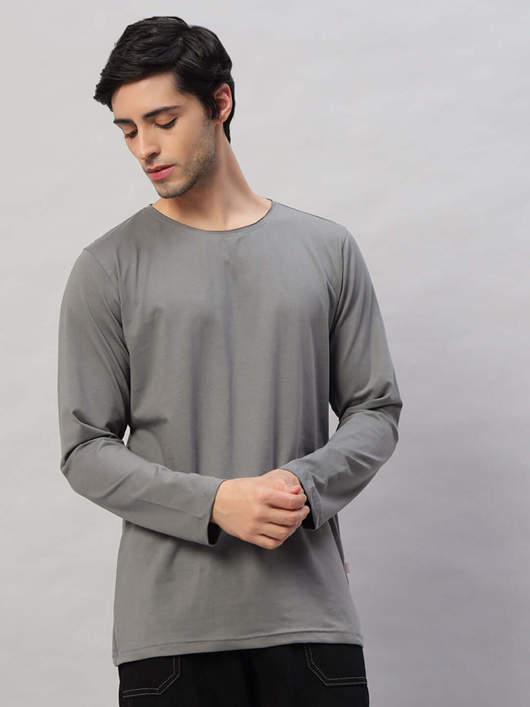 Model wearing OMNI Slim Fit Grey Sweatshirt made of 100% cotton, showcasing premium heavy gauge fabric. Cold machine wash recommended.