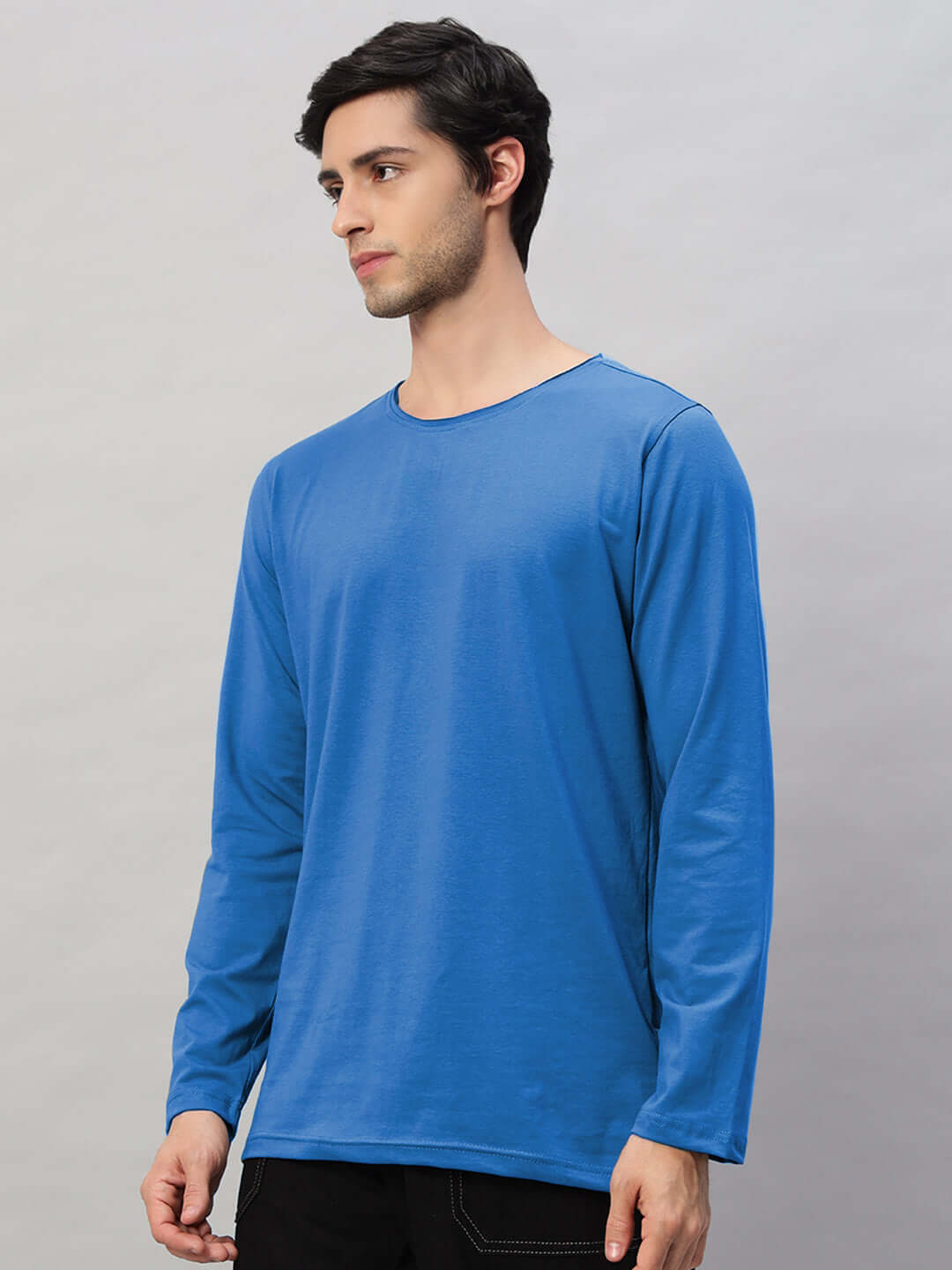 Model wearing Omni Slim Fit Sweatshirt in royal blue, crafted from 100% bio-washed cotton for premium comfort, made in India.