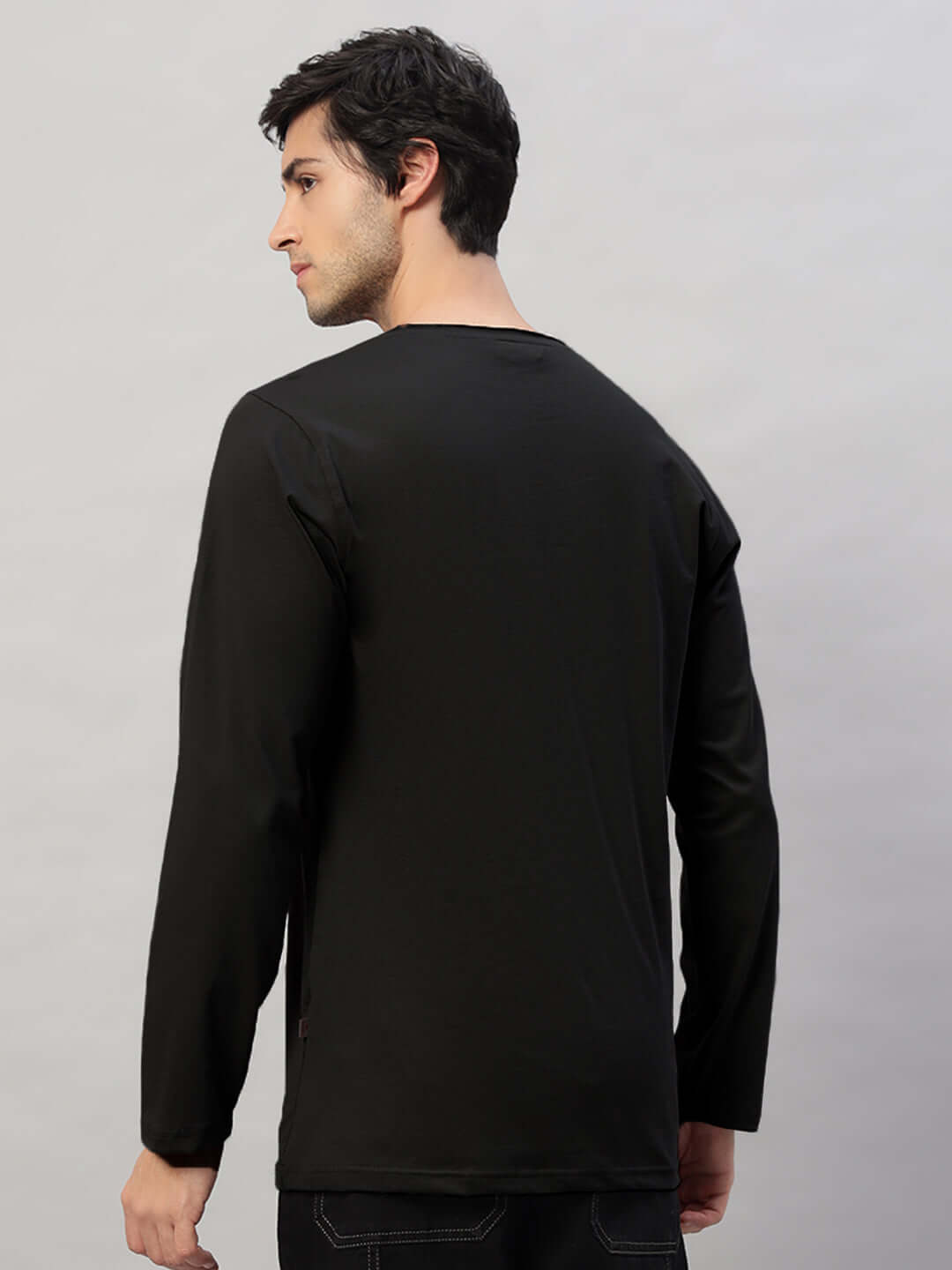 Model wearing OMNI Slim Fit Black Sweatshirt, back view, made from 100% cotton, highlighting its premium heavy gauge fabric and sleek design.