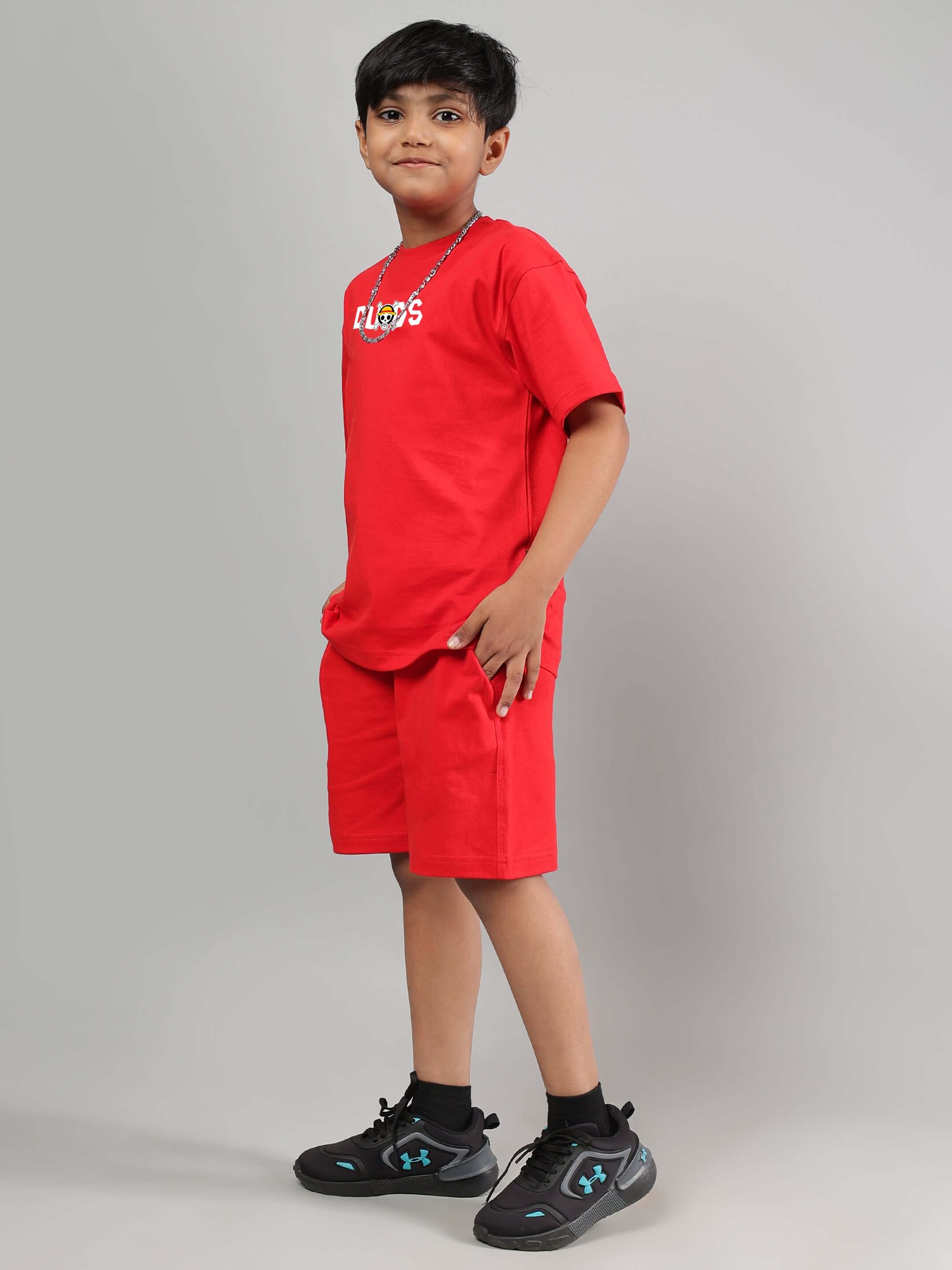 Boy wearing ONE PIECE SUMMER CO-ORD FOR BOYS GIRLS RED outfit, featuring premium cotton-blend fabric for comfort and style.