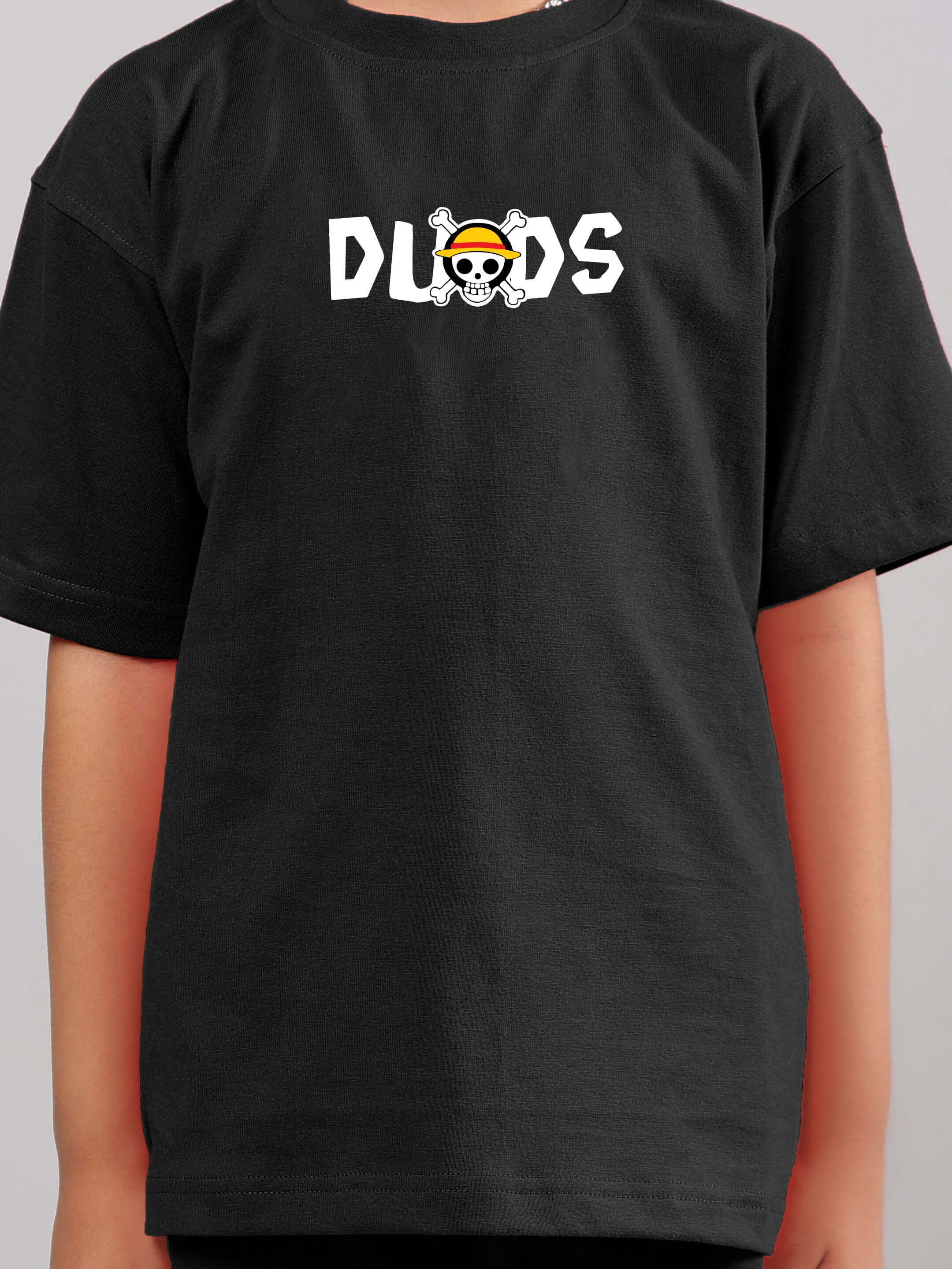 Black One Piece T-Shirt for Boys & Girls featuring DUDS logo, customizable size option available.