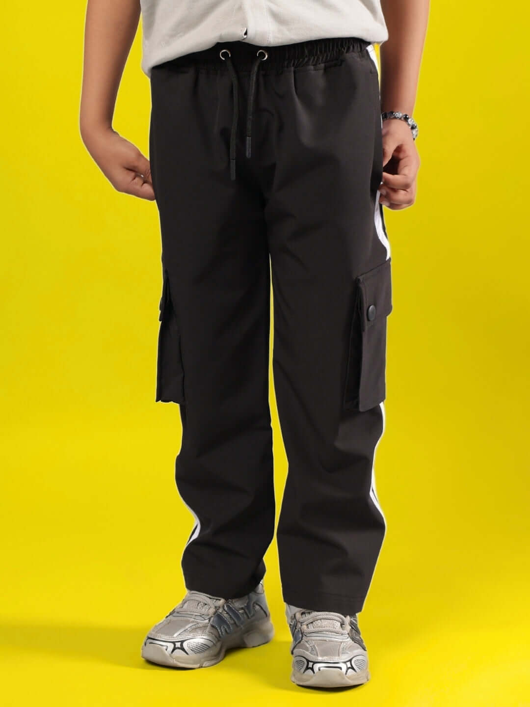 ORION CO-ORD FOR BOYS & GIRLS GREY-BLACK cargo pants on child model against yellow background