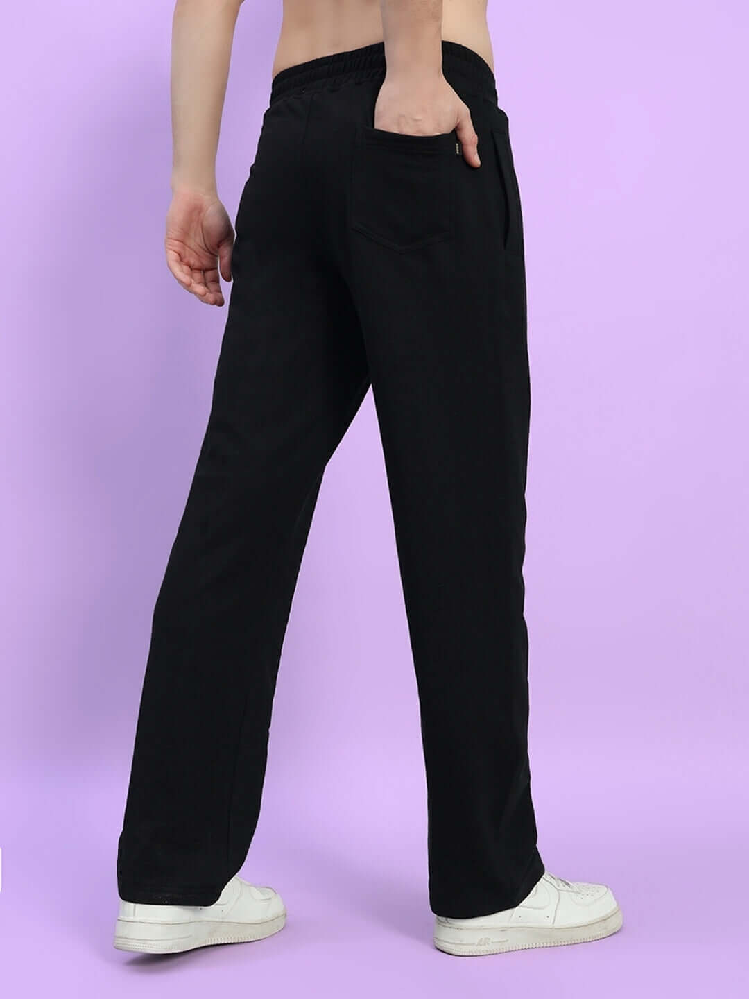Model wearing Outlook 2 Stripe Jogger in black, showcasing comfortable design and tailored fit for customization options.