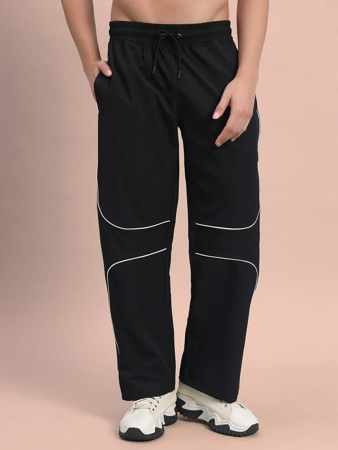 Black Parabolic Parachute Cargo Pants with customizable fit option, displayed on a model against a neutral background.