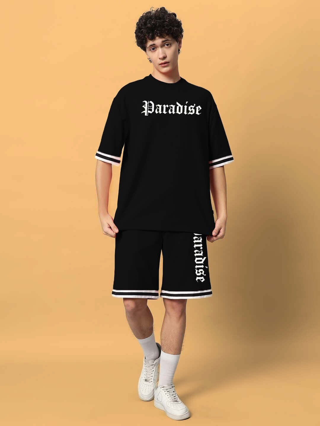 Model wearing Paradise Colorblock Co-ord Set in black, made of premium cotton French terry lycra, highlighting comfort and style.