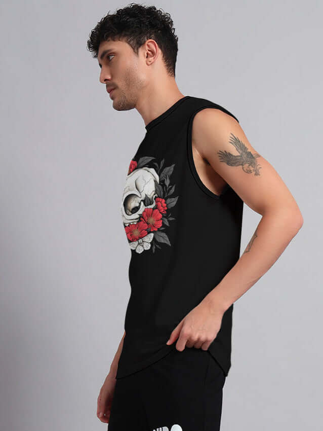 Model wearing PEONIES SKULL REGULAR FIT T-SHIRT BLACK with skull and peonies design, ideal for casual and edgy fashion enthusiasts.