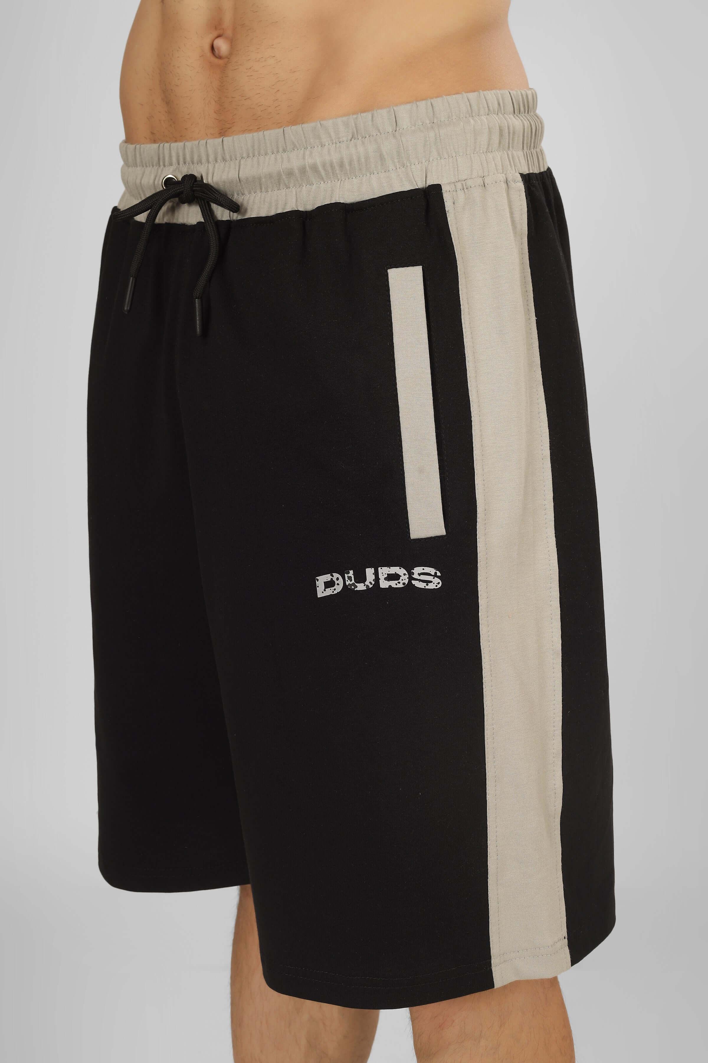 Black Pluto Contrast Regular Fit Shorts with beige side panels and drawstring waistband, custom fit available, by DUDS.