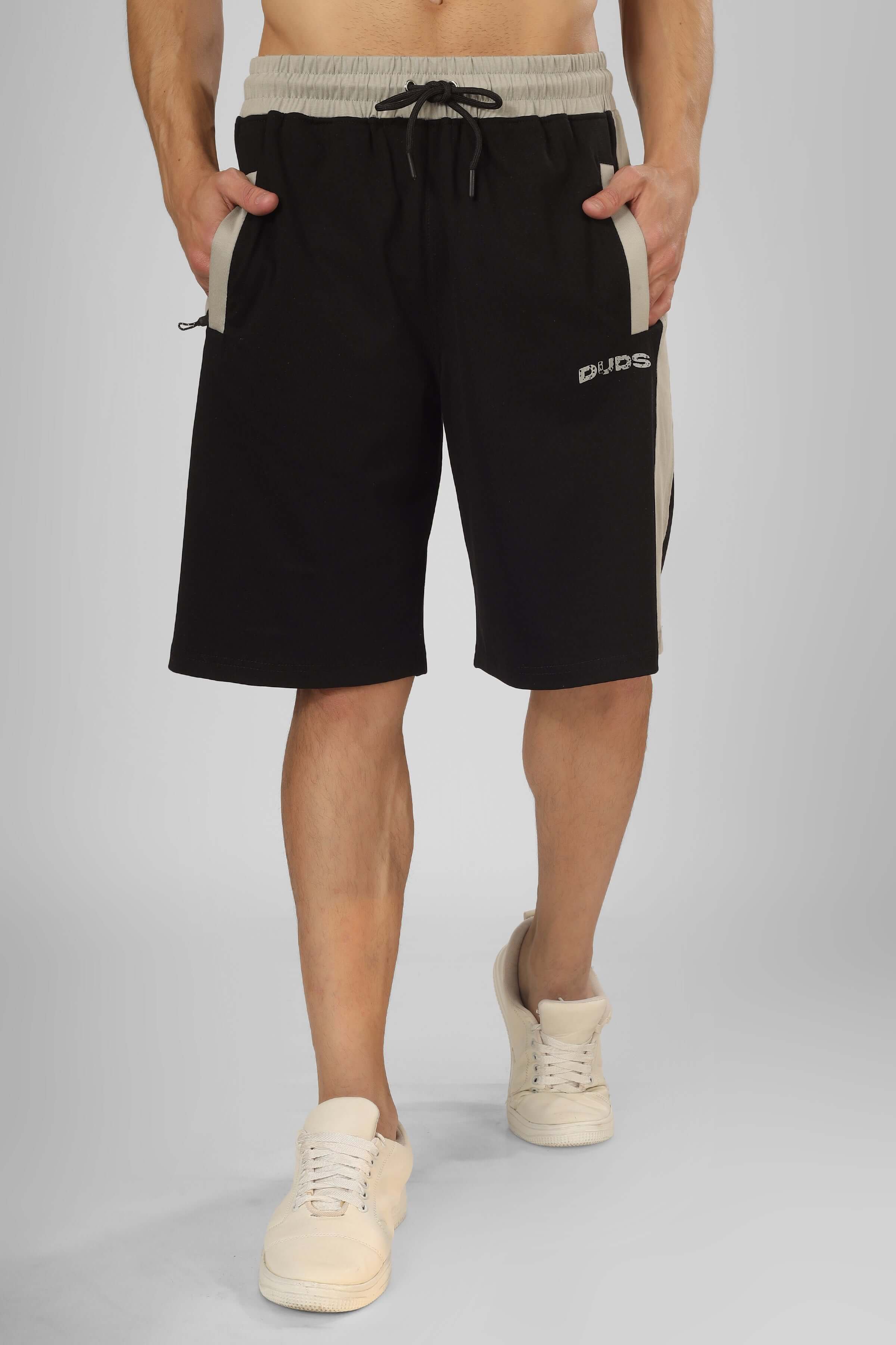 Person wearing black PLUTO Contrast Regular Fit Shorts, featuring comfortable design and customizable size option. Perfect for casual wear.