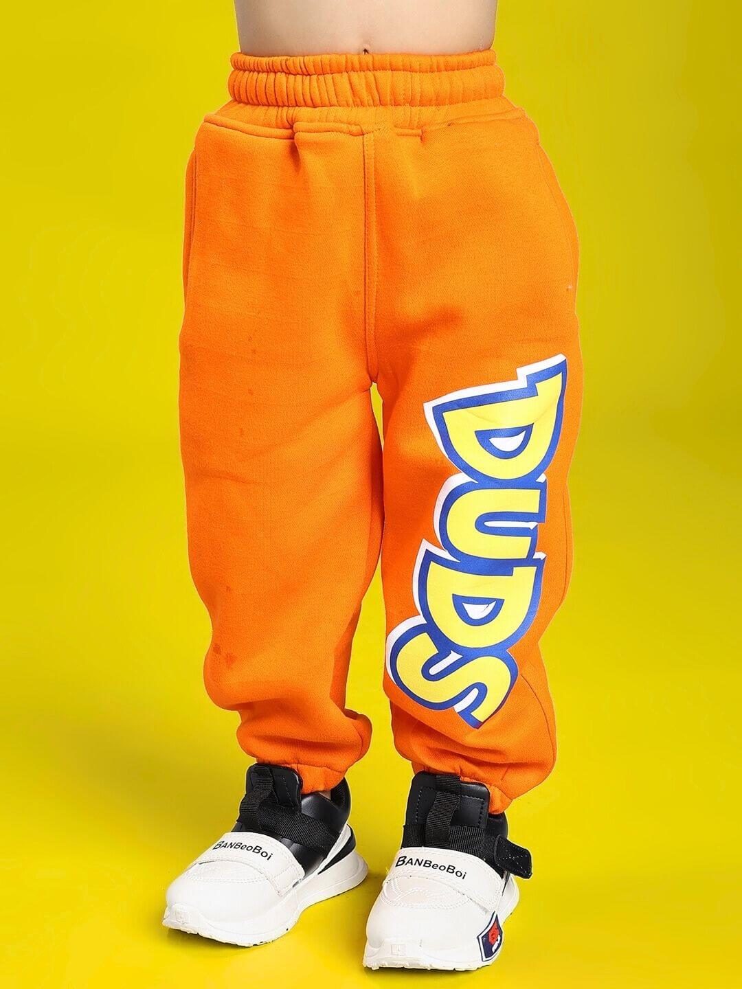 POKEMON TOON FLEECE JOGGER FOR BOYS AND GIRLS ORANGE with cartoon design displayed on a vibrant background.
