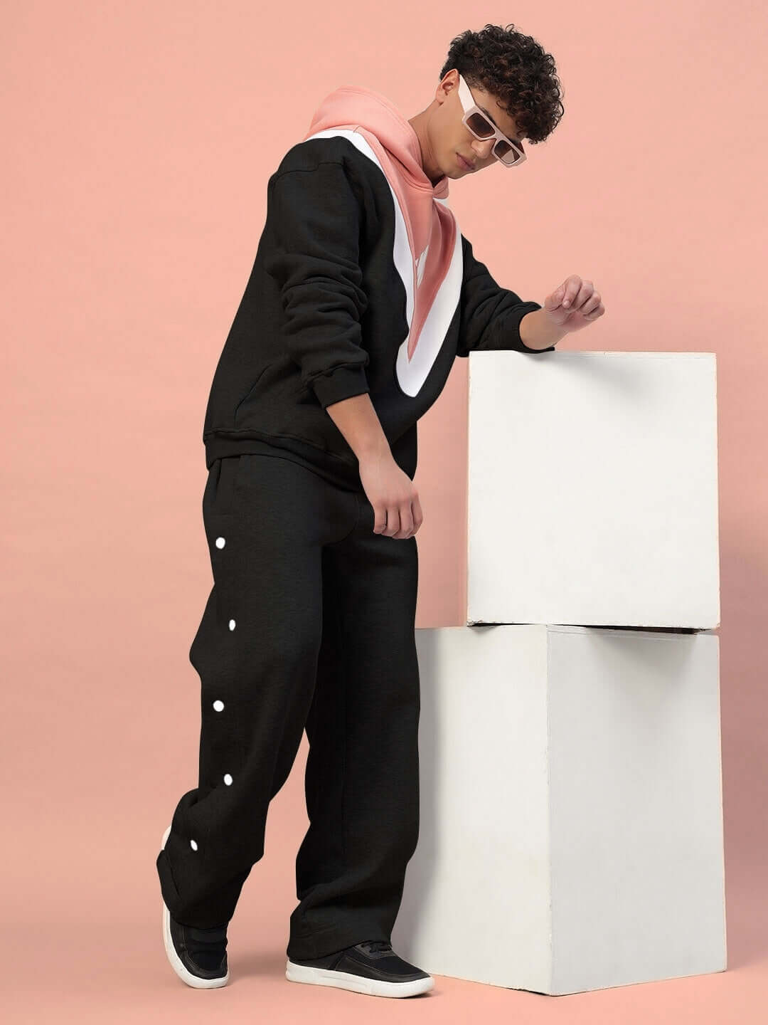 Model wearing POLAR COLORBLOCK CO-ORD BLACK PEACH with vibrant style.