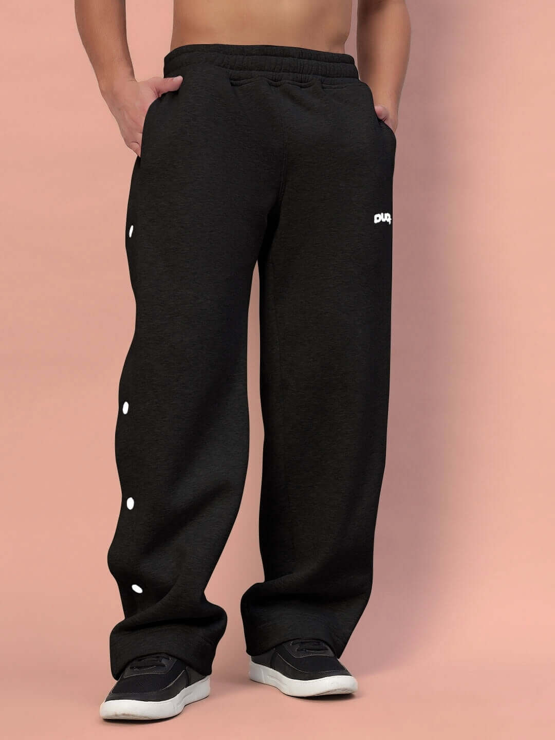 Model wearing POLAR Cotton Fleece Jogger in black, showcasing comfortable fit and stylish design by DUDS, available for custom fit.