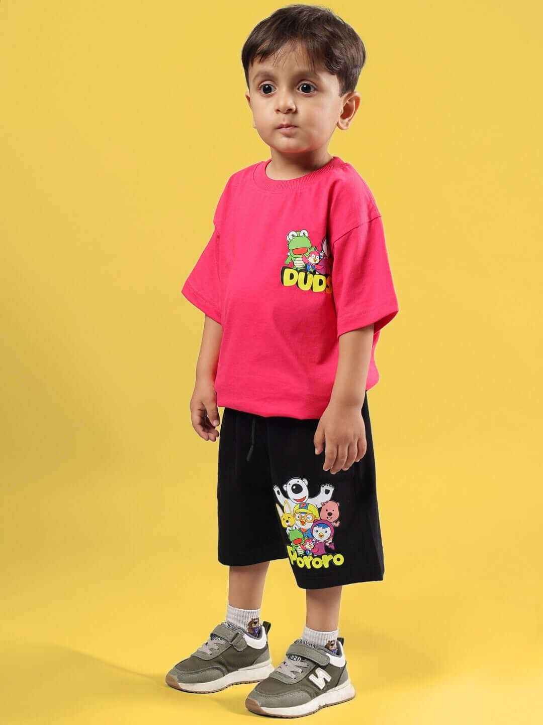 Child wearing Pororo Oversized T-Shirt in Pink, unisex for boys and girls, with playful design, perfect for comfort and style.