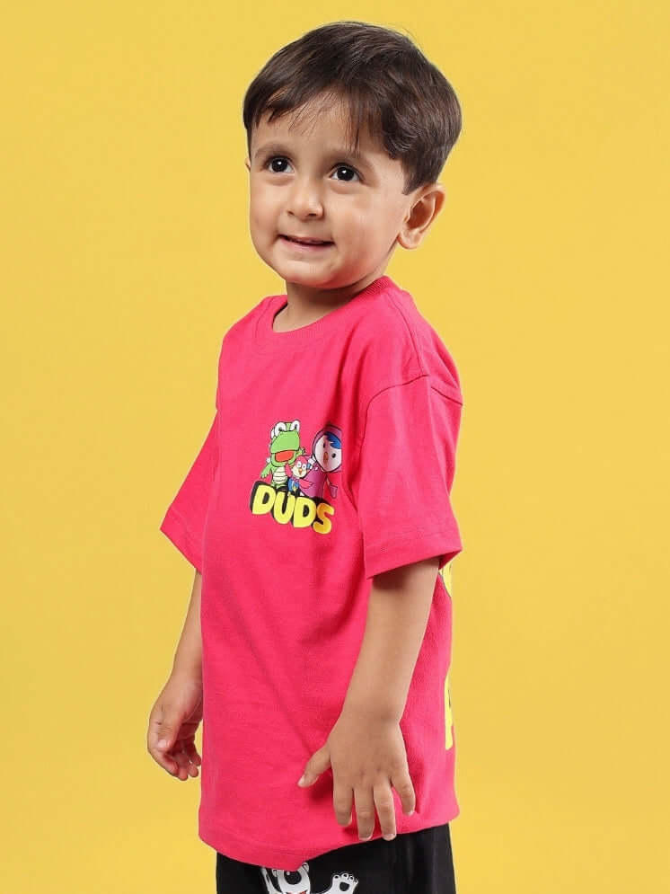 Child wearing PORORO OVERSIZED T-SHIRT FOR BOYS GIRLS PINK on yellow background