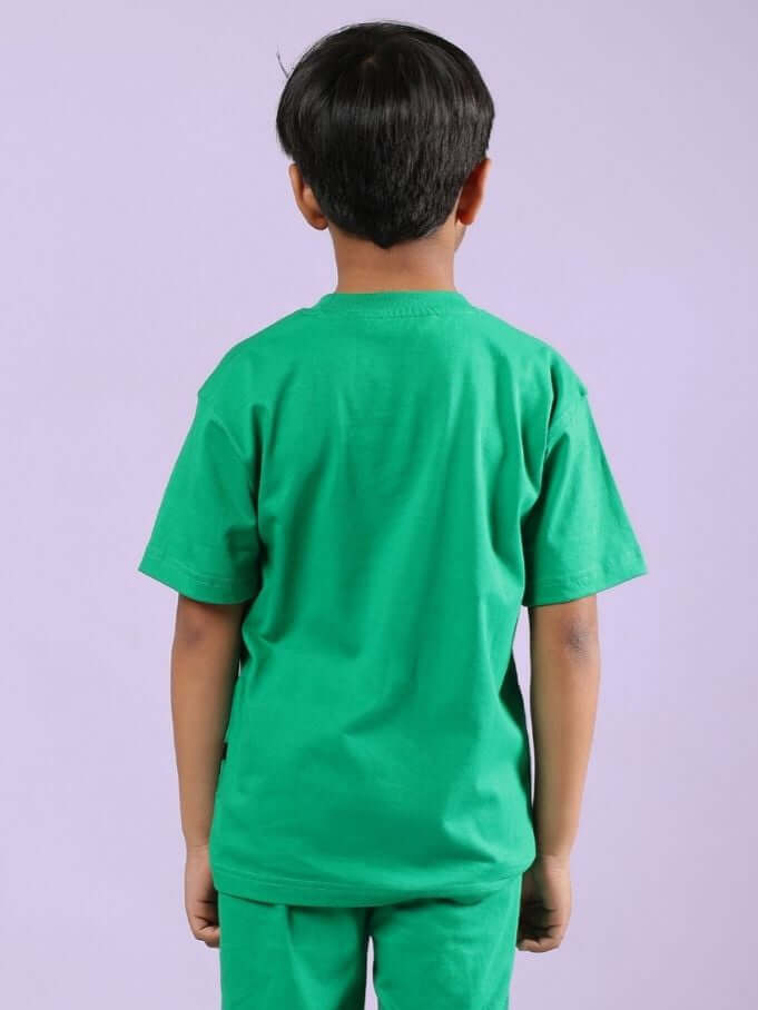 Back view of a child wearing a Power Punch T-Shirt for Boys and Girls Green, showcasing comfort and style in vibrant green.