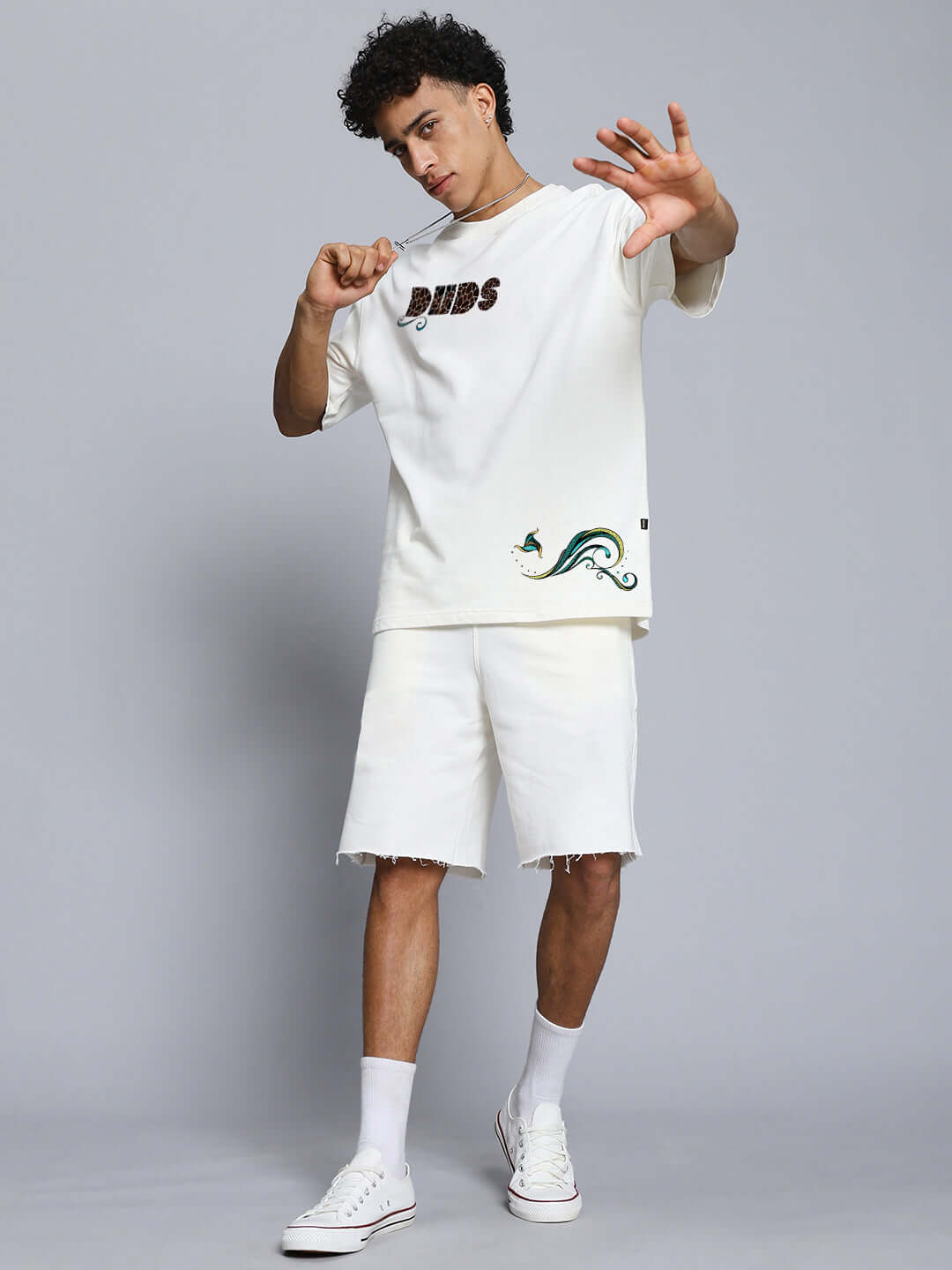 Model wearing Premium Fish Print Co-Ord Set Off White with shorts and casual footwear, showcasing trendy, playful design for kids.