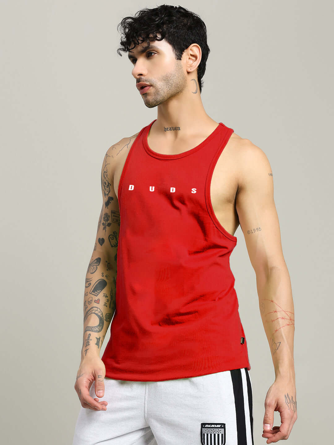 Man wearing Primo Gym T-Shirt Red Premium Workout Tee showcasing athletic fit and breathable fabric for intense workouts.