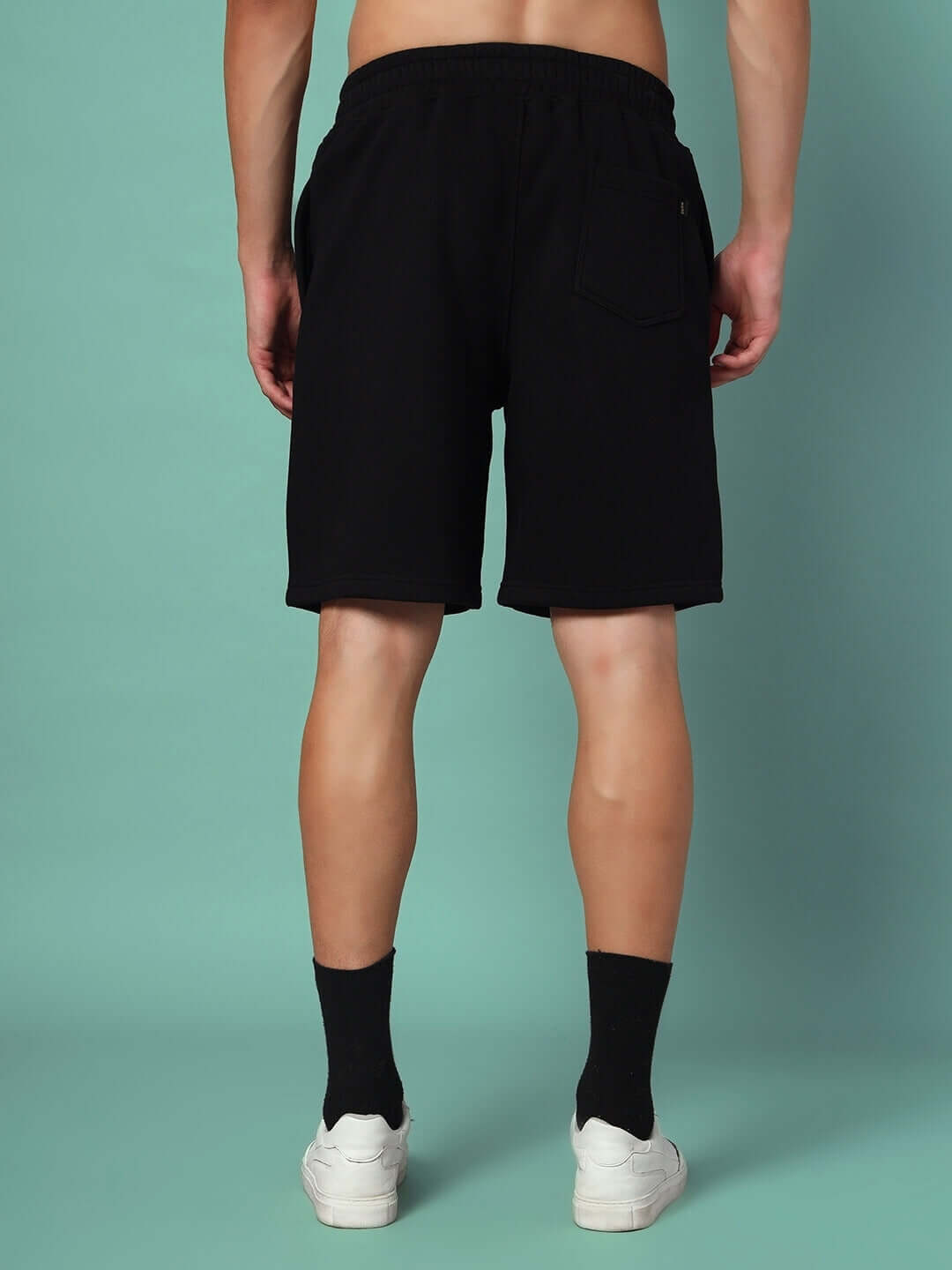 Back view of RACING FOX FLEECE SHORTS BLACK showcasing sleek design and comfortable fit for streetwear and casual style.