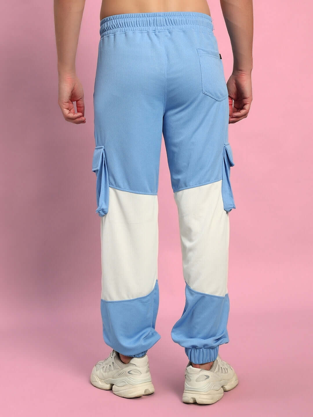Radiant relaxed fit joggers in white and sky blue, featuring customizable size and made-to-order tailoring by DUDS with premium quality.