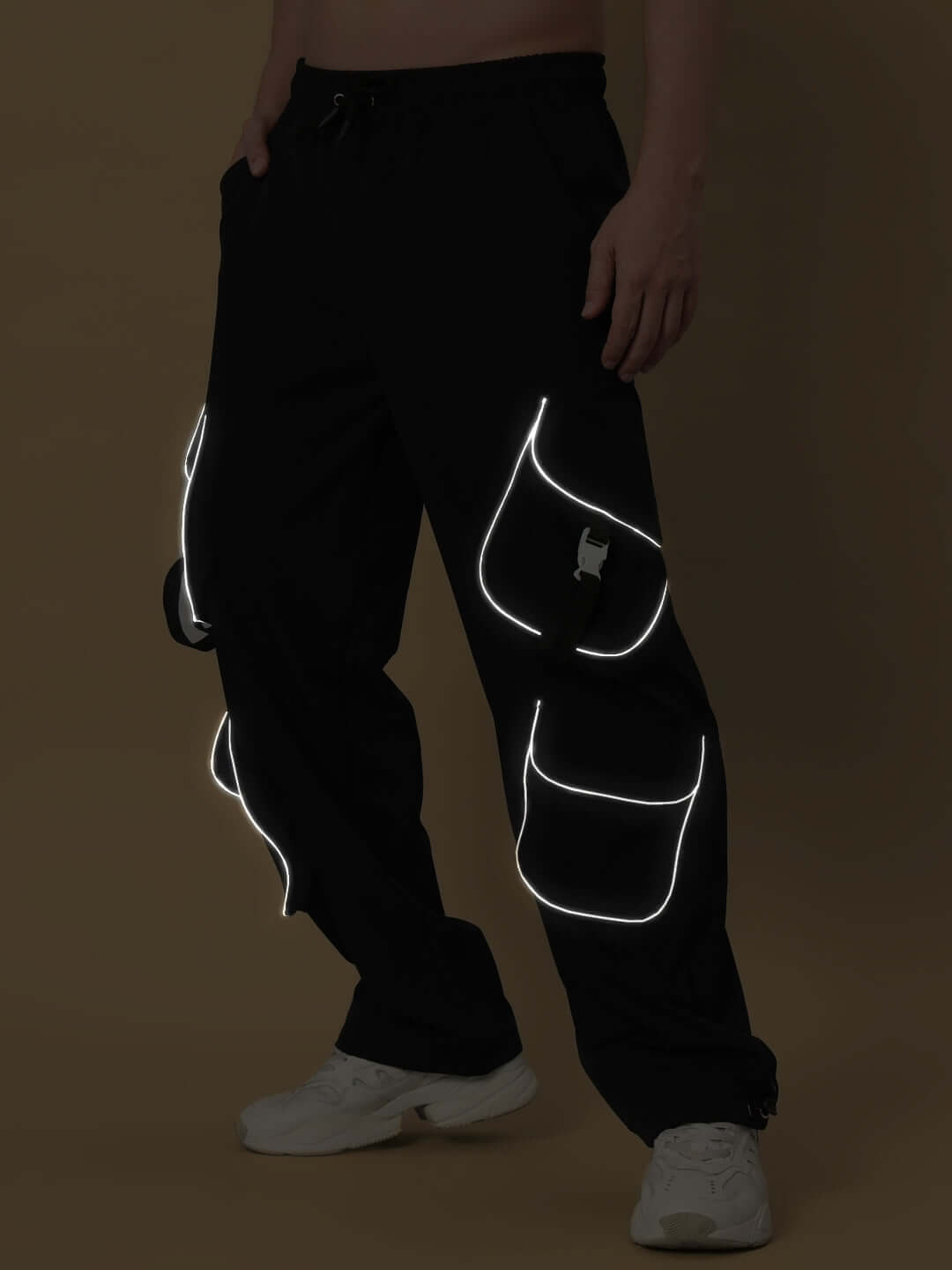 Black Ragga Reflector Parachute Cargo Pants with customizable size options and highlighted pockets, perfect for unique style.