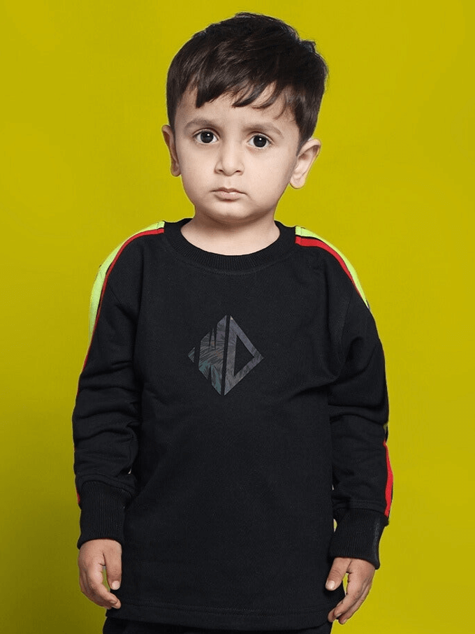 Child wearing RAINBOW OVERSIZED SWEATSHIRT BOYS & GIRLS BLACK with colorful design by WEAR DUDS