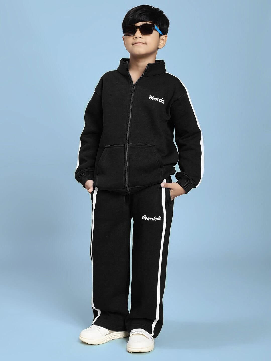 Child wearing RAPID STRIDE FLEECE CO-ORD FOR BOYS AND GIRLS BLACK with a jacket and joggers.