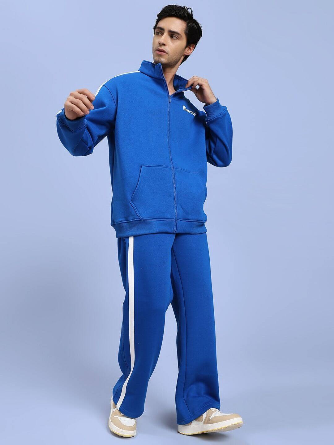 Model wearing the RAPID STRIDE ROYAL BLUE COTTON FLEECE CO-ORD SET, showcasing a cozy and stylish design for active individuals.
