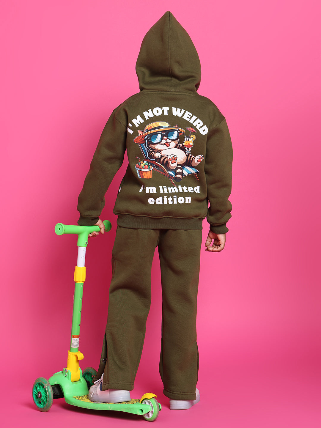 Child wearing olive green hoodie with "I'm Not Weird, I'm Limited Edition" slogan, part of the RARE EDITION CO-ORD FOR BOYS GIRLS OLIVE GREEN set.