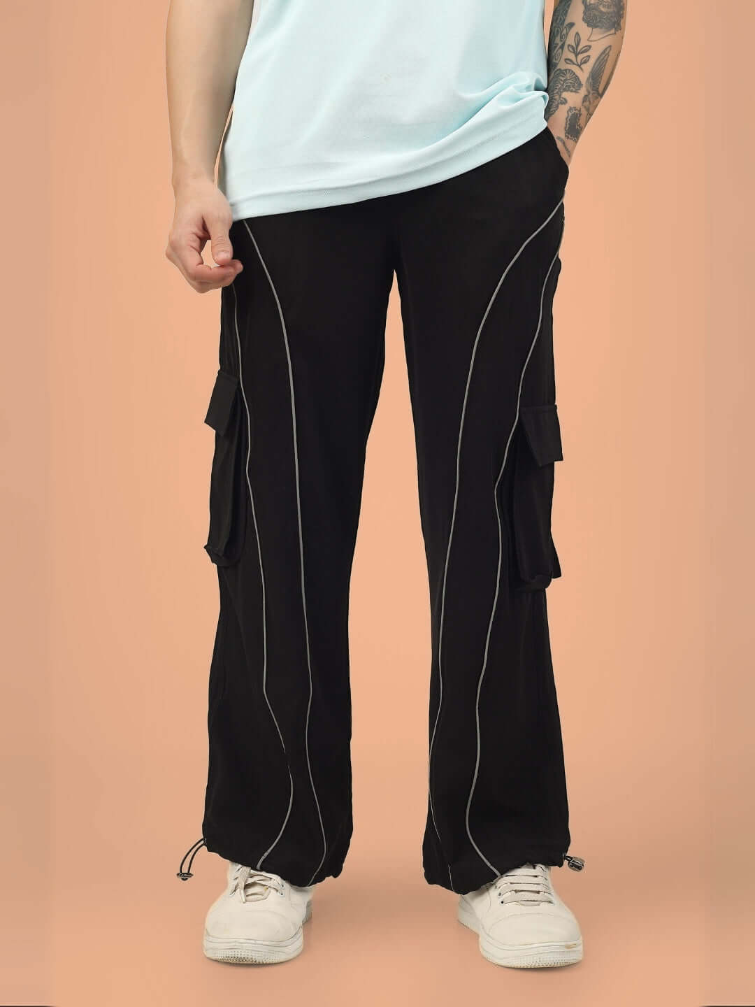 Black Ray Reflector Parachute Cargo Pants with adjustable custom fit option and stylish stitching details.