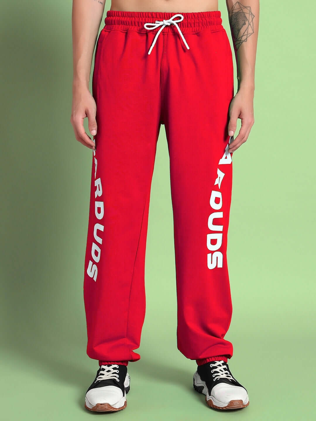 Red Ellen Relaxed Fit Jogger by DUDS, featuring a comfortable design with a drawstring waist, available in custom sizes on pre-order.